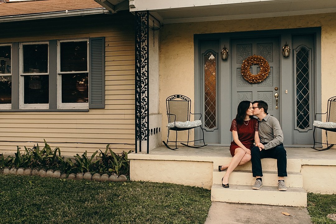 couple in front of their houston heights home
