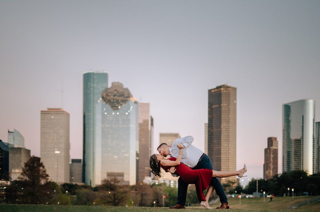 Houston Engagement photos in front of the houston skyline
