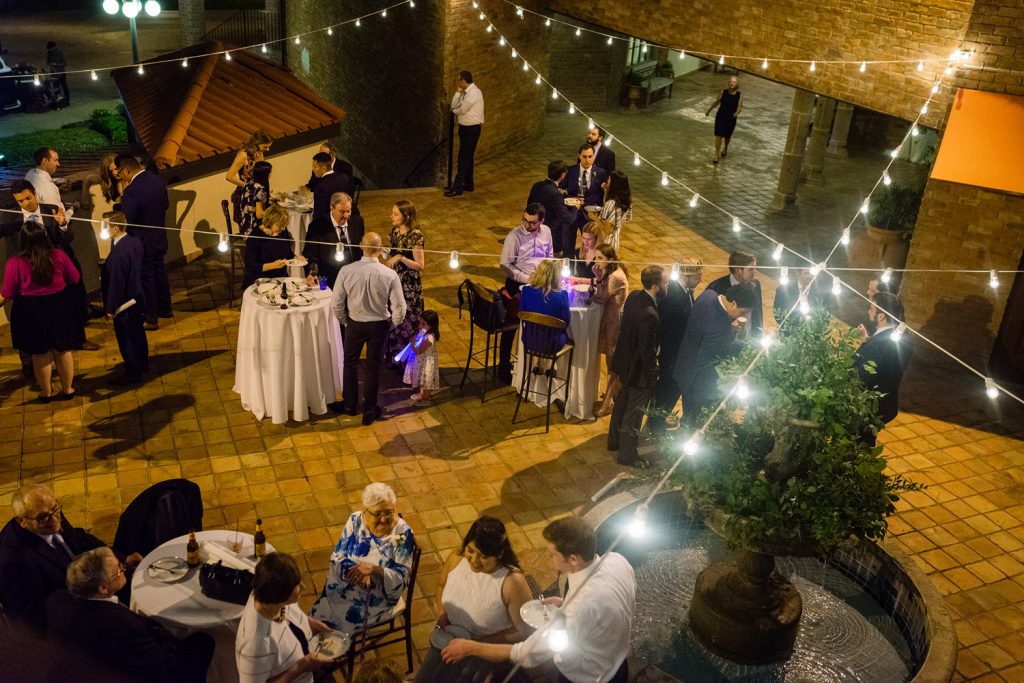 guests outside at night to show the patio at night